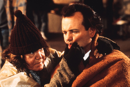 (L-R) Anne Ramsey as the Woman in the Shelter and Bill Murray as Frank Cross in 