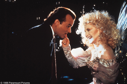 (L-R) Bill Murray as Frank Cross and Carol Kane as the Ghost of Christmas Present in 