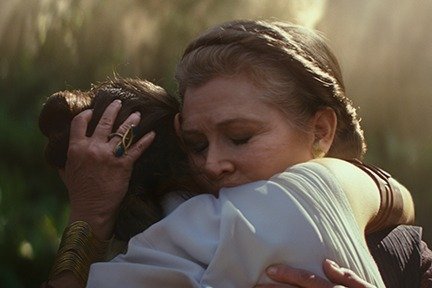 Carrie Fisher as General Leia Organa and Daisy Ridley as Rey in 