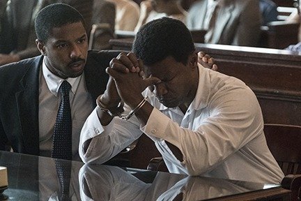 Michael B. Jordan as Bryan Stevenson and Jamie Foxx as Walter McMillian in 