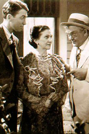 George, Mrs. Bailey and Uncle Billy on the porch.