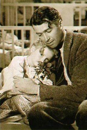 George comforts Zuzu after a petal falls.